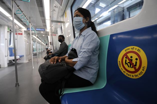 Stickers pasted on seats for adherence of social distancing inside metro train, during a mock drill at Sector 51 Metro Station, ahead Noida.(Sunil Ghosh/HT (Photos for representational purposes only))