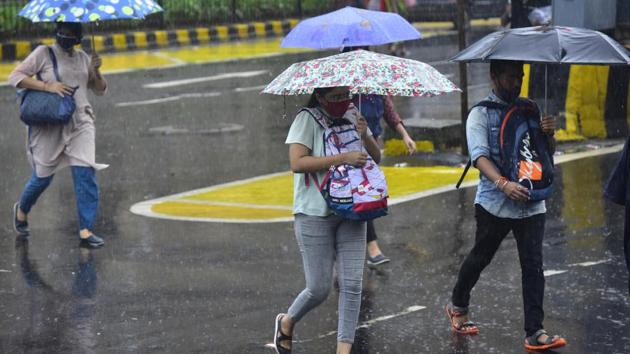 People out during heavy rain at CSMT in Mumbai on August 28. India this year has recorded its rainiest August in 44 years, data from the India Meteorological Department (IMD) shows, filling up agricultural reservoirs and recharging groundwater across large parts of the country in what could help the prospects of farmers for the next cropping season. (Anshuman Poyrekar / HT Photo)