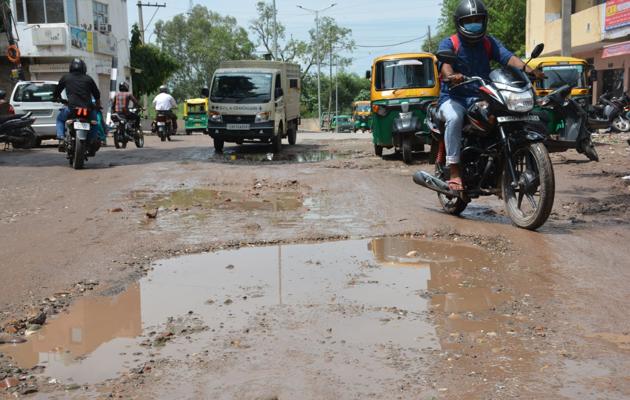 Road repair work in Chandigarh had to be postponed due to lockdown restrictions and later, during the monsoons.(Sant Arora/HT)