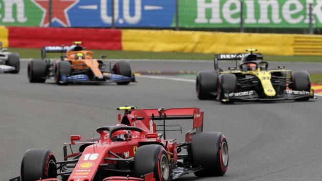 Ferrari driver Charles Leclerc of Monaco leads Renault driver Esteban Ocon of France steers his car during the qualifying session for the Formula One Grand Prix at the Spa-Francorchamps racetrack in Spa, Belgium Saturday, Aug. 29, 2020. (Stephanie Lecocq, Pool via AP)(AP)