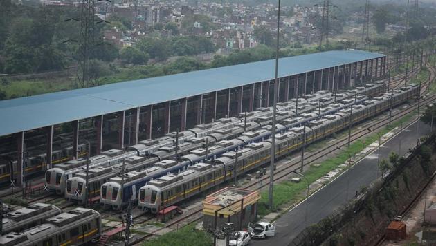 Delhi Metro trains are seen at a parking bay in Timarpur depot, New Delhi. The Delhi Metro has been shut since March when the first lockdown was imposed to check the spread of coronavirus.(Sanchit Khanna/HT PHOTO) Delhi Metro trains are seen at a parking bay in Timarpur depot, New Delhi. The Delhi Metro has been shut since March when the first lockdown was imposed to check the spread of coronavirus.(Sanchit Khanna/HT PHOTO)