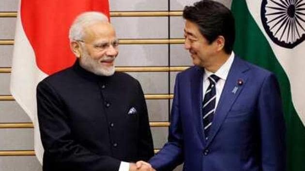 Prime Minister Narendra Modi with Japan’s former premier Shinzo Abe.(AP file photo)