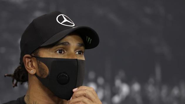 Race winner Mercedes driver Lewis Hamilton of Britain speaks during a media conference after the Formula One Grand Prix at the Spa-Francorchamps racetrack in Spa, Belgium Sunday, Aug. 30, 2020. (Lars Baron, Pool via AP)(AP)