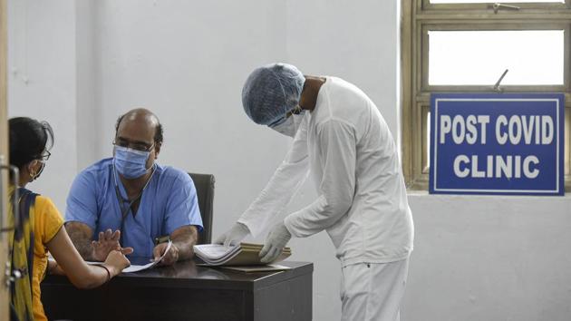 A woman who recovered from Covid-19 infection consults a doctor at Rajiv Gandhi Super Speciality Hospital in New Delhi on August 30. In the last 24 hours, 10,16,920 tests were conducted taking the total number of tests conducted so far in the country to over 43 million till August 31 midnight. (Biplov Bhuyan / HT Photo) A woman who recovered from Covid-19 infection consults a doctor at Rajiv Gandhi Super Speciality Hospital in New Delhi on August 30. In the last 24 hours, 10,16,920 tests were conducted taking the total number of tests conducted so far in the country to over 43 million till August 31 midnight. (Biplov Bhuyan / HT Photo)