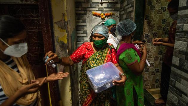 Health care workers conduct door to door screenings of residents in Saki Naka, Mumbai on August 30. India became the first country in the world on August 30 to report more than 80,000 new cases of the coronavirus disease (Covid-19) in a single day, as the outbreak continued to grow and set new records. A total of 80,097 new infections were reported on the day, according to HT’s dashboard. (Pratik Chorge / HT Photo) Health care workers conduct door to door screenings of residents in Saki Naka, Mumbai on August 30. India became the first country in the world on August 30 to report more than 80,000 new cases of the coronavirus disease (Covid-19) in a single day, as the outbreak continued to grow and set new records. A total of 80,097 new infections were reported on the day, according to HT’s dashboard. (Pratik Chorge / HT Photo)