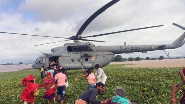 Indian Air Force airlifts flood-affected people in Sihor on Sunday. (ANI Photo)(ANI) Indian Air Force airlifts flood-affected people in Sihor on Sunday. (ANI Photo)(ANI)