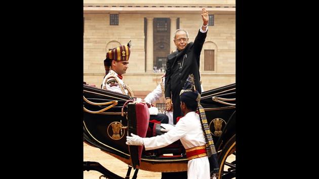 Newly appointed President Pranab Mukherjee, in a traditional horse driven carriage, waves to the media as he arrives at the Rashtrapati Bhawan, in New Delhi on July 25, 2012. As finance minister, Mukherjee had a fiery innings. He surprised the world by sending back a $1.1 billion instalment of the International Monetary Fund (IMF) loan. He also opened the NRI investment window, which pioneered sweeping changes in India’s image as a destination of foreign funds. (Ajay Aggarwal / HT Archive) Newly appointed President Pranab Mukherjee, in a traditional horse driven carriage, waves to the media as he arrives at the Rashtrapati Bhawan, in New Delhi on July 25, 2012. As finance minister, Mukherjee had a fiery innings. He surprised the world by sending back a $1.1 billion instalment of the International Monetary Fund (IMF) loan. He also opened the NRI investment window, which pioneered sweeping changes in India’s image as a destination of foreign funds. (Ajay Aggarwal / HT Archive)