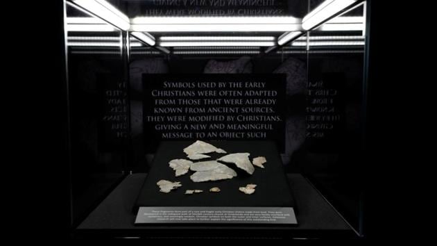 Pieces of a 1,400-year-old Christian chalice found at the Vindolanda Roman fort, believed to be the oldest artifact of its kind ever found in Britain, are seen on display for the first time at a museum in Northumberland, Britain August 31, 2020. REUTERS/Lee Smith (REUTERS)