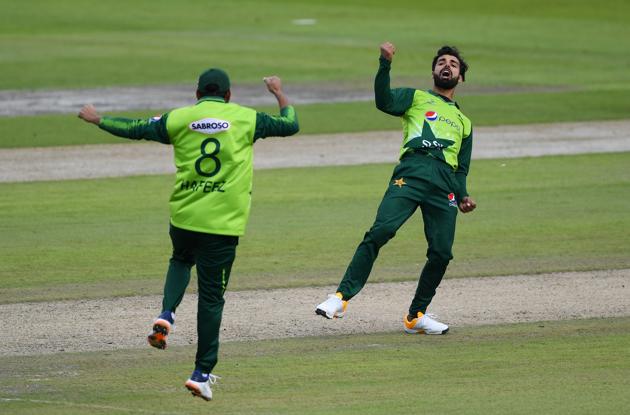 Cricket - Second T20 International - England v Pakistan - Emirates Old Trafford, Manchester, Britain - August 30, 2020 Pakistan's Shadab Khan celebrates taking a wicket Mike Hewitt/Pool via REUTERS (REUTERS)