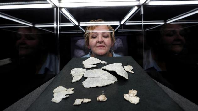 Pieces of a 1,400-year-old Christian chalice found at the Vindolanda Roman fort believed to be the oldest artefact of its kind ever found in Britain, are seen on display for the first time at the Vindolanda Museum in Northumberland, Britain August 31, 2020. REUTERS/Lee Smith (REUTERS)
