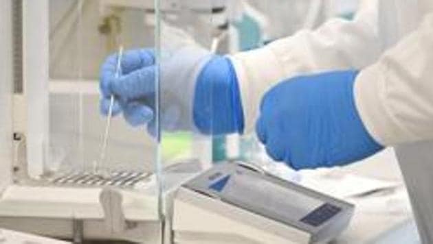 A chemist works at AstraZeneca's headquarters, after Prime Minister Scott Morrison announced Australians will be among the first in the world to receive a coronavirus disease (Covid-19) vaccine, if it proves successful, through an agreement between the government and UK-based drug company AstraZeneca, in Sydney, Australia.(Reuters File Photo) A chemist works at AstraZeneca's headquarters, after Prime Minister Scott Morrison announced Australians will be among the first in the world to receive a coronavirus disease (Covid-19) vaccine, if it proves successful, through an agreement between the government and UK-based drug company AstraZeneca, in Sydney, Australia.(Reuters File Photo)