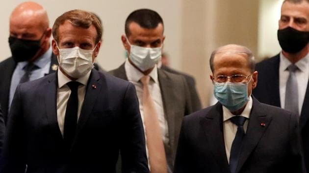French President Emmanuel Macron and Lebanese President Michel Aoun leave after their meeting at Beirut International airport, Lebanon.(REUTERS) French President Emmanuel Macron and Lebanese President Michel Aoun leave after their meeting at Beirut International airport, Lebanon.(REUTERS)