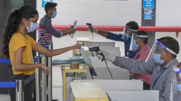 Students undergo thermal scanning as they arrive at an examination centre to appear in Joint Entrance Examination (JEE ) Main-2020 amid COVID-19 pandemic, in Noida (PTI) Students undergo thermal scanning as they arrive at an examination centre to appear in Joint Entrance Examination (JEE ) Main-2020 amid COVID-19 pandemic, in Noida (PTI)
