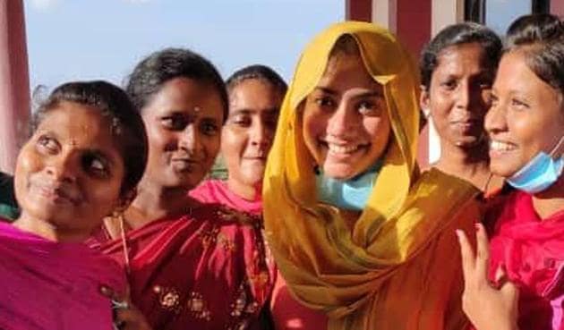 Sai Pallavi poses with fans.