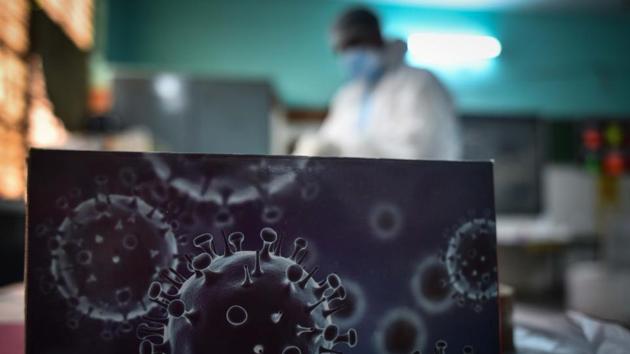 An illustration of the novel coronavirus seen on a slide at a testing centre in New Delhi on September 1. With day-on-day coronavirus cases breaching the 2,000-mark for the third time in a week, Delhi recorded 2,509 new cases on September 2, the highest since July 3 according to the Delhi government’s numbers. (Sanchit Khanna / HT Photo) An illustration of the novel coronavirus seen on a slide at a testing centre in New Delhi on September 1. With day-on-day coronavirus cases breaching the 2,000-mark for the third time in a week, Delhi recorded 2,509 new cases on September 2, the highest since July 3 according to the Delhi government’s numbers. (Sanchit Khanna / HT Photo)