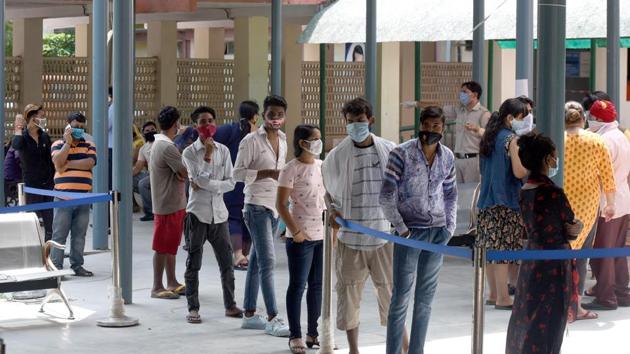 People wait their turns for coronavirus testing at Nehru Homoeopathic Medical College and Hospital in New Delhi on August 31. The positivity rate – the percentage of people who test positive for the virus of those overall who have been tested – has also been increasing over the last two weeks. Delhi has recorded a seven-day average positivity rate of 8.9%, with a one-day high of 9.9% on August 30. (Sonu Mehta / HT Photo) People wait their turns for coronavirus testing at Nehru Homoeopathic Medical College and Hospital in New Delhi on August 31. The positivity rate – the percentage of people who test positive for the virus of those overall who have been tested – has also been increasing over the last two weeks. Delhi has recorded a seven-day average positivity rate of 8.9%, with a one-day high of 9.9% on August 30. (Sonu Mehta / HT Photo)