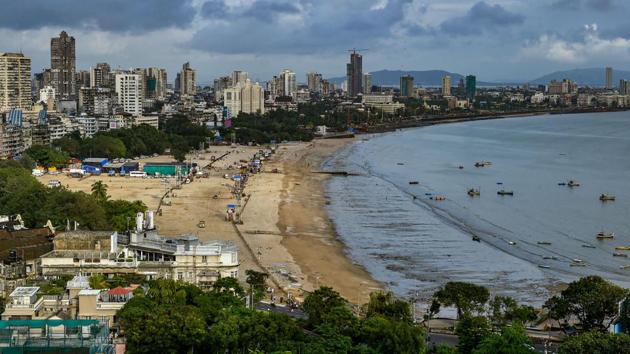 A top angle view of Girgaum Chowpatty looking empty on the day of Ganpati Visarjan as authorities had issued a set of guidelines in the view of Covid-19 pandemic in Mumbai on Tuesday. (PTI File Photo) A top angle view of Girgaum Chowpatty looking empty on the day of Ganpati Visarjan as authorities had issued a set of guidelines in the view of Covid-19 pandemic in Mumbai on Tuesday. (PTI File Photo)
