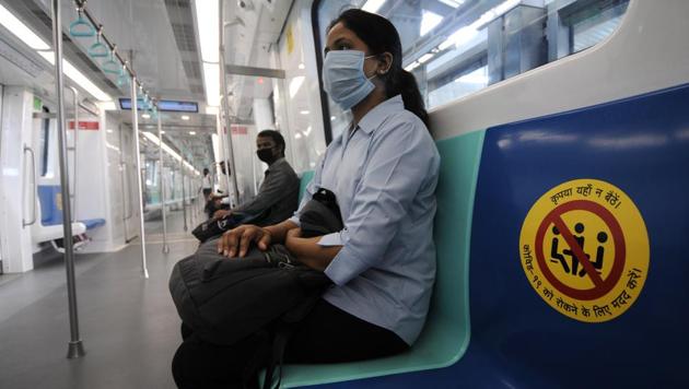 Stickers pasted on seats for adherence of social distance as commuters are seen inside metro during a mock drill, at Sector 51 metro station, ahead of resumption of metro services in Noida.(Sunil Ghosh /HT File Photo)
