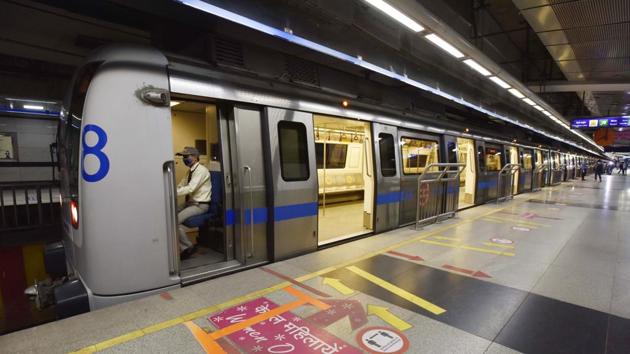 A metro train driver seen during a press preview at Rajiv Chowk Metro Station ahead of the resumption of metro services in New Delhi on September 3. Arrangements have also been made to spot passengers flouting guidelines and train drivers, through a real-time communication system, will be directed to not stop trains at such stations. (Sanjeev Verma / HT Photo) A metro train driver seen during a press preview at Rajiv Chowk Metro Station ahead of the resumption of metro services in New Delhi on September 3. Arrangements have also been made to spot passengers flouting guidelines and train drivers, through a real-time communication system, will be directed to not stop trains at such stations. (Sanjeev Verma / HT Photo)