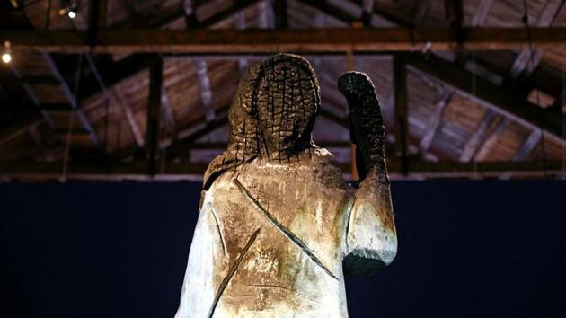 A wooden statue of Melania Trump is seen in the exhibition Fuck off illusion from the artist Brad Downey in Koper, Slovenia, September 1, 2020. Picture taken September 1, 2020.(REUTERS)