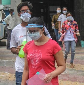 Students leave an examination centre after appearing for JEE in Gurugram on Wednesday.(PTI)