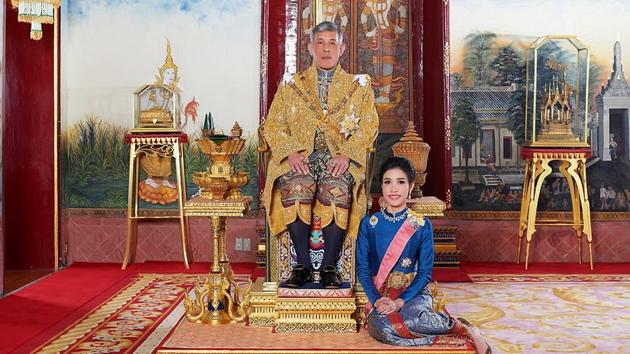 Thailand's King Maha Vajiralongkorn and General Sineenat Wongvajirapakdi, the royal noble consort pose at the Grand Palace in Bangkok, Thailand, in this undated handout photo obtained by Reuters September 2, 2020.(Reuters Photo)