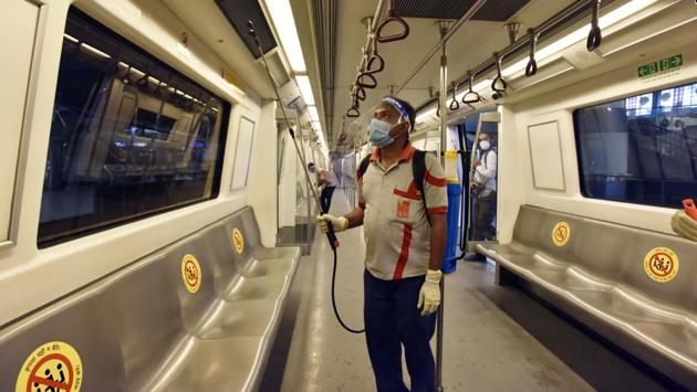 A Delhi Metro worker sanitizes a metro coach during a press preview in New Delhi on September 3. States with a large number of cases, Maharashtra, Andhra Pradesh, Tamil Nadu and Karnataka continue to exhibit signs that the contagion is spreading fast with no peak in sight, according to data analysed by HT. (Sanjeev Verma / HT Photo) A Delhi Metro worker sanitizes a metro coach during a press preview in New Delhi on September 3. States with a large number of cases, Maharashtra, Andhra Pradesh, Tamil Nadu and Karnataka continue to exhibit signs that the contagion is spreading fast with no peak in sight, according to data analysed by HT. (Sanjeev Verma / HT Photo)