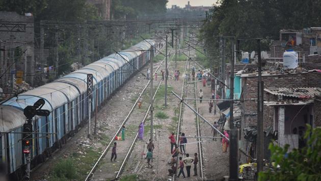 People from adjoining slums walking along railway tracks at Anand Parbat in New Delhi on September 3. India’s tally of the coronavirus disease (Covid-19) has reached 4,023,179 after 86,432 new cases were recorded across the country in the highest single-day spike yet, according to the Union health ministry on September 5. (Sanchit Khanna / HT Photo) People from adjoining slums walking along railway tracks at Anand Parbat in New Delhi on September 3. India’s tally of the coronavirus disease (Covid-19) has reached 4,023,179 after 86,432 new cases were recorded across the country in the highest single-day spike yet, according to the Union health ministry on September 5. (Sanchit Khanna / HT Photo)