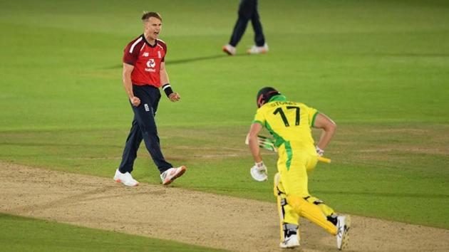England’s Tom Curran defended 15 runs off the final over as England edged Australia by two runs in a last-ball thriller. (Image Credit: ICC)