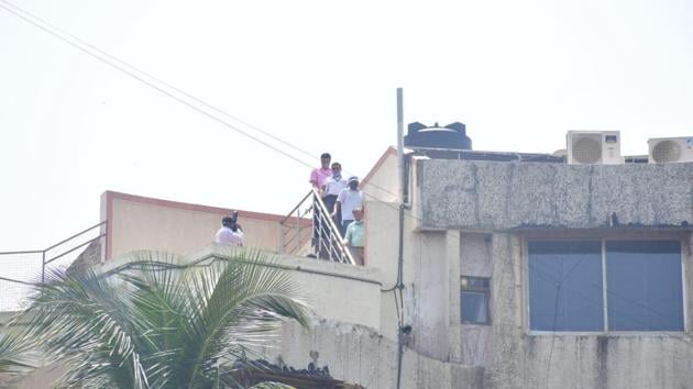 CBI officials at Sushant Singh Rajput’s home in Mumbai’s Bandra.(Varinder Chawla)