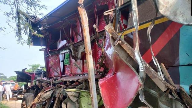 Bus carrying labourers lies mangled at accident site.(ANI)