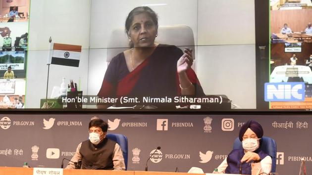 Union Minister of Finance and Corporate Affairs Nirmala Sitharaman addresses the media via video conference in the presence of Union Minister of Commerce and Industry Piyush Goyal and Union Minister of Housing and Urban Affairs Hardeep Singh Puri at National Media Centre in New Delhi.(Arvind Yadav/HT PHOTO) Union Minister of Finance and Corporate Affairs Nirmala Sitharaman addresses the media via video conference in the presence of Union Minister of Commerce and Industry Piyush Goyal and Union Minister of Housing and Urban Affairs Hardeep Singh Puri at National Media Centre in New Delhi.(Arvind Yadav/HT PHOTO)