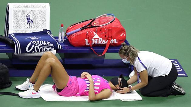A trainer works on Madison Keys during her Women’s Singles third round match against Alize Cornet. (Getty Images)