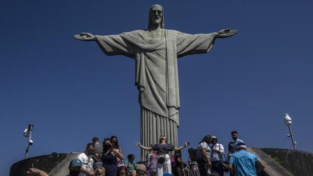 Visitors wearing face masks gather at the Christ the Redeemer statue in Rio de Janeiro, Brazil on September 4. Brazil’s cumulative Covid-19 tally as of September 7 stands at 4,137,606 cases and 126,686 deaths. (Dado Galdieri / Bloomberg) Visitors wearing face masks gather at the Christ the Redeemer statue in Rio de Janeiro, Brazil on September 4. Brazil’s cumulative Covid-19 tally as of September 7 stands at 4,137,606 cases and 126,686 deaths. (Dado Galdieri / Bloomberg)