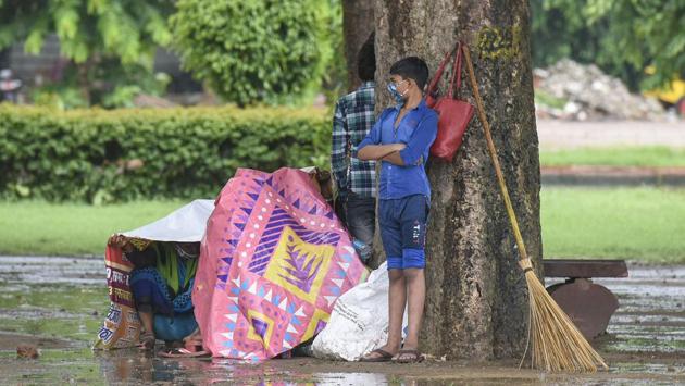 People take cover under a tree while it rains at India Gate in New Delhi on September 5. India’s case fatality rate (CFR) from the disease is currently 1.7% —better than not only than the global average of 3.2%, but also the US and Brazil – both at 3%. (Biplov Bhuyan / HT Photo) People take cover under a tree while it rains at India Gate in New Delhi on September 5. India’s case fatality rate (CFR) from the disease is currently 1.7% —better than not only than the global average of 3.2%, but also the US and Brazil – both at 3%. (Biplov Bhuyan / HT Photo)