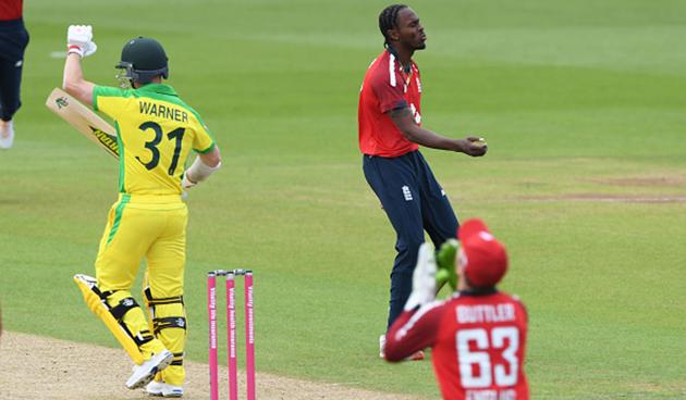 Archer only needed three balls to make the breakthrough for England in dismissing David Warner. The Australia opener got the faintest of touches on a quick delivery he was given out after Buttler took the catch (getty)