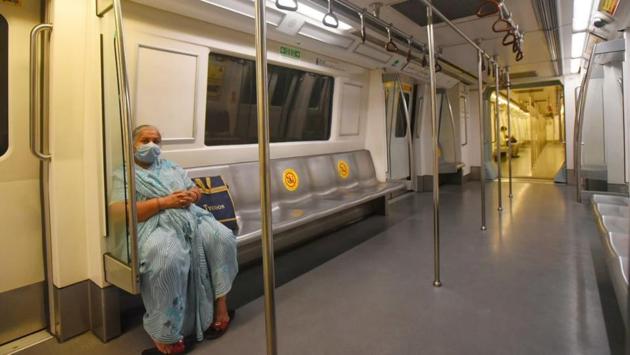 Elderly lady passenger travels by the Delhi Metro. (Amal KS/HT)