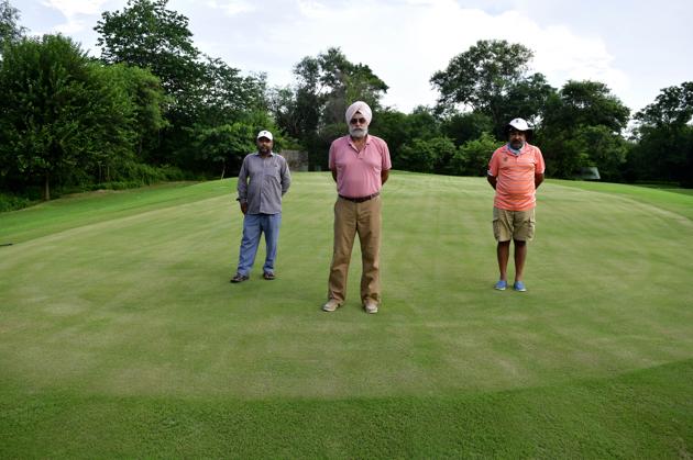 Ready for a round: SPS Matharoo, CGC captain (centre), Amrit Inder Singh, course manager and professional golfer (right) and Surjit Singh, assistant course manager, at the newly re-laid greens at hole 12 of the 18-hold Chandigarh Golf Course.(Ravi Kumar/HT PHOTO)