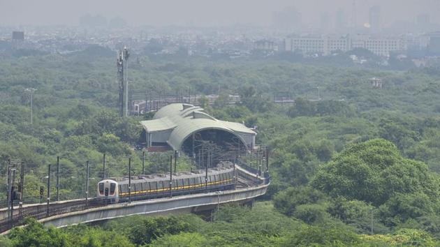 A Yellow Line metro train leaves a station following resumption of operations by the Delhi Metro Rail Corporation (DMRC) in New Delhi on September 7. After being shut for 169 days due to Covid-19, the Delhi Metro on September 7 resumed services, opening limited corridors to passengers, while ensuring that social distancing norms were adhered to. (Sanjeev Verma / HT Photo)