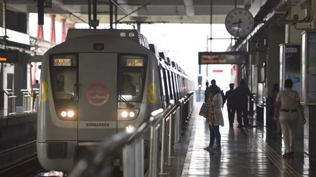 A train rolls into the platform at HUDA City Centre Metro Station on September 7. In phase 1 of the graded resumption, metro services will be available on the Yellow Line connecting Samaypur Badli to Huda City Centre and Rapid Metro in Gurugram and the operating hours are 7 am to 11 am and 4 pm hours to 8 pm. (Sanjeev Verma / HT Photo)
