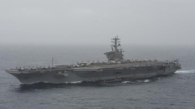 In this photo released by the US Navy, the aircraft carrier USS Nimitz transits the Arabian Sea.(AP) In this photo released by the US Navy, the aircraft carrier USS Nimitz transits the Arabian Sea.(AP)