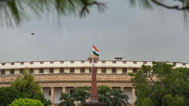 New Delhi: Indian national flag flutters during a breeze as dark clouds hover over the Parliament, during monsoon season, in New Delhi, Tuesday, July 21, 2020. (PTI) New Delhi: Indian national flag flutters during a breeze as dark clouds hover over the Parliament, during monsoon season, in New Delhi, Tuesday, July 21, 2020. (PTI)