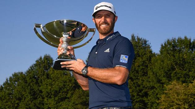 Dustin Johnson with the FedEx Cup.(Getty Images)