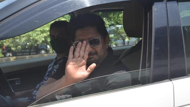 Actor Arshad Warsi, who was recently seen in Asur, waves at the photographers. (Varinder Chawla)