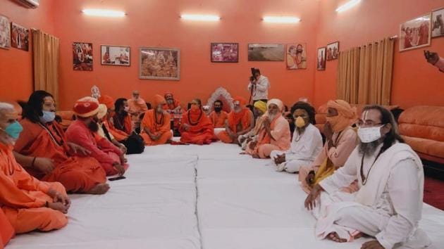 Saints attending meeting of Akhada Parishad in Prayagraj on Monday.(HT PHOTO)