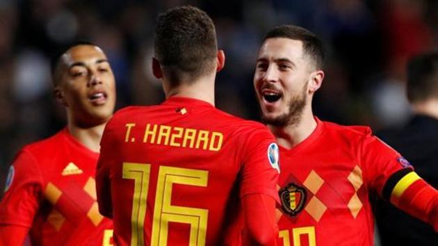 Belgium's Eden Hazard celebrates scoring their first goal with Thorgan Hazard.(REUTERS)