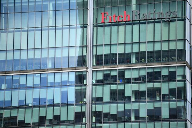 FILE PHOTO: The offices of Fitch Ratings building appears empty in Canary Wharf, following the outbreak of the coronavirus disease (COVID-19), London, Britain, May 27, 2020. REUTERS/Dylan Martinez/File photo FILE PHOTO: The offices of Fitch Ratings building appears empty in Canary Wharf, following the outbreak of the coronavirus disease (COVID-19), London, Britain, May 27, 2020. REUTERS/Dylan Martinez/File photo