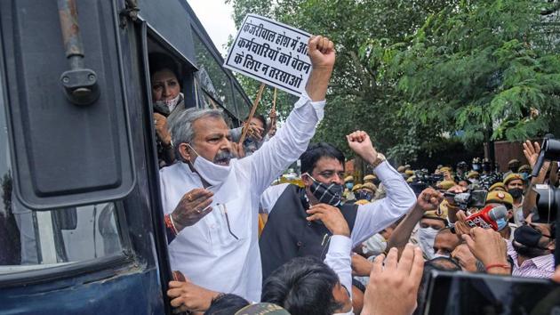 Delhi BJP President Adesh Kumar Gupta along with BJP Councilors from North, South & East MCD protest at Civic centre against Delhi government for allegedly not releasing funds payable to MCD, in New Delhi.(ANI)