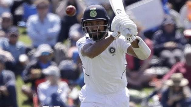 India's Cheteshwar Pujara watches the ball while battling during play on day one of the second cricket test between New Zealand and India at Hagley Oval in Christchurch.(AP) India's Cheteshwar Pujara watches the ball while battling during play on day one of the second cricket test between New Zealand and India at Hagley Oval in Christchurch.(AP)