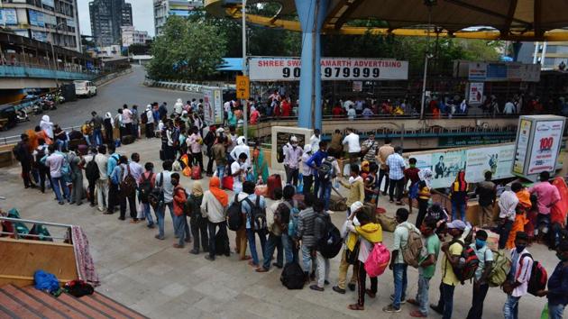Migrant workers queue outside Thane Municipal Corporation’s Covid-19 testing centre upon their arrival in Thane on September 07. The Covid-19 testing rates have been revised four times until now to bring them down from the initial rates ranging between ₹4,500 to ₹5,200. (Praful Gangurde / HT Photo)